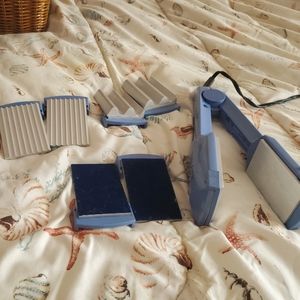 Conair Shiny Styles straightener. Comes with attachments.